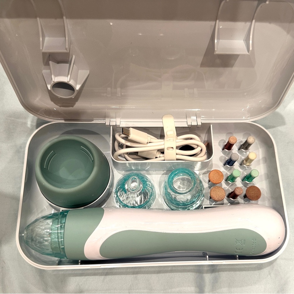 PMD personal microderm elite pro. Skincare exfoliation tool with vacuum suction